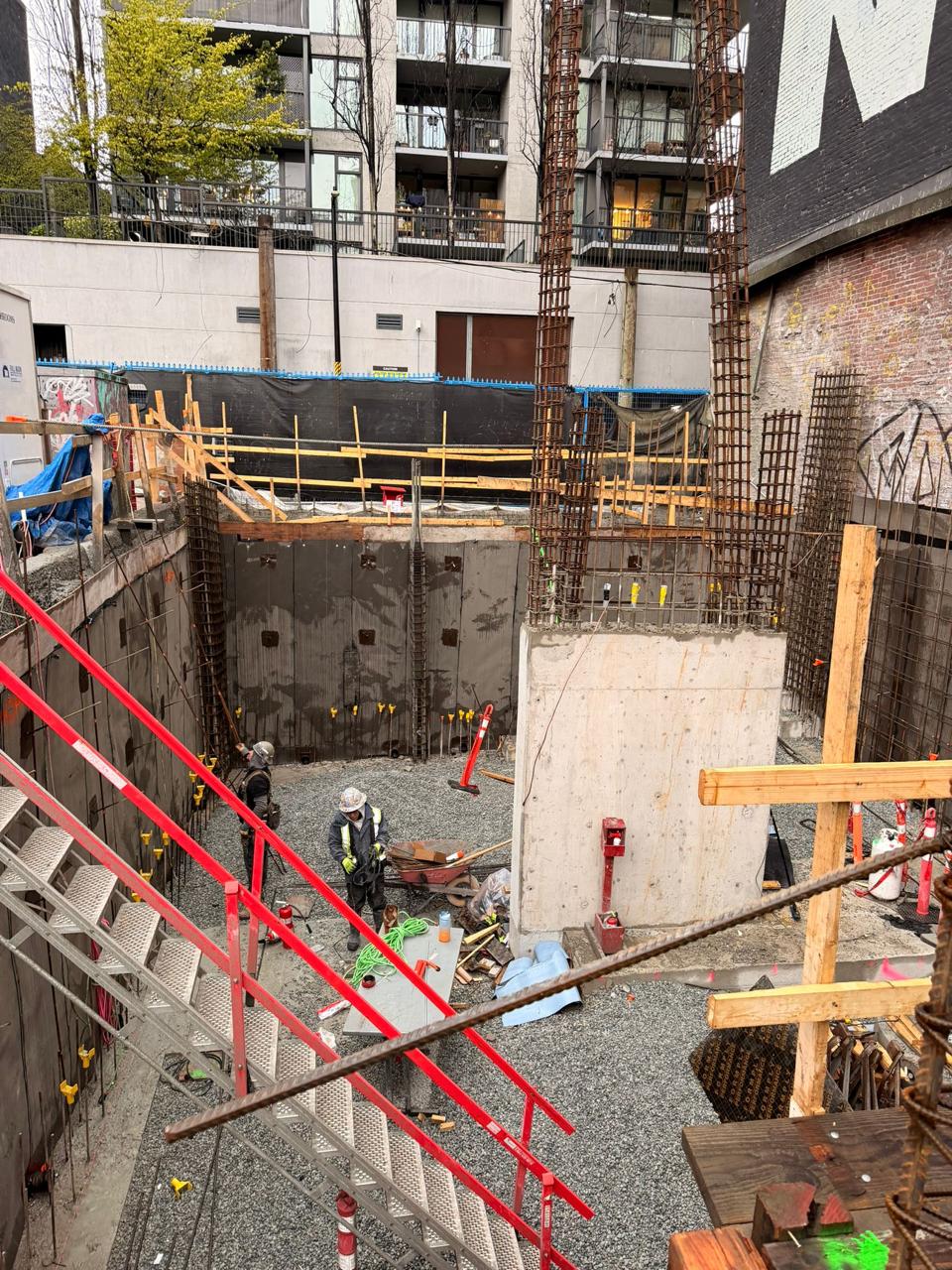 Concrete slab shoring and forming system on an active job site